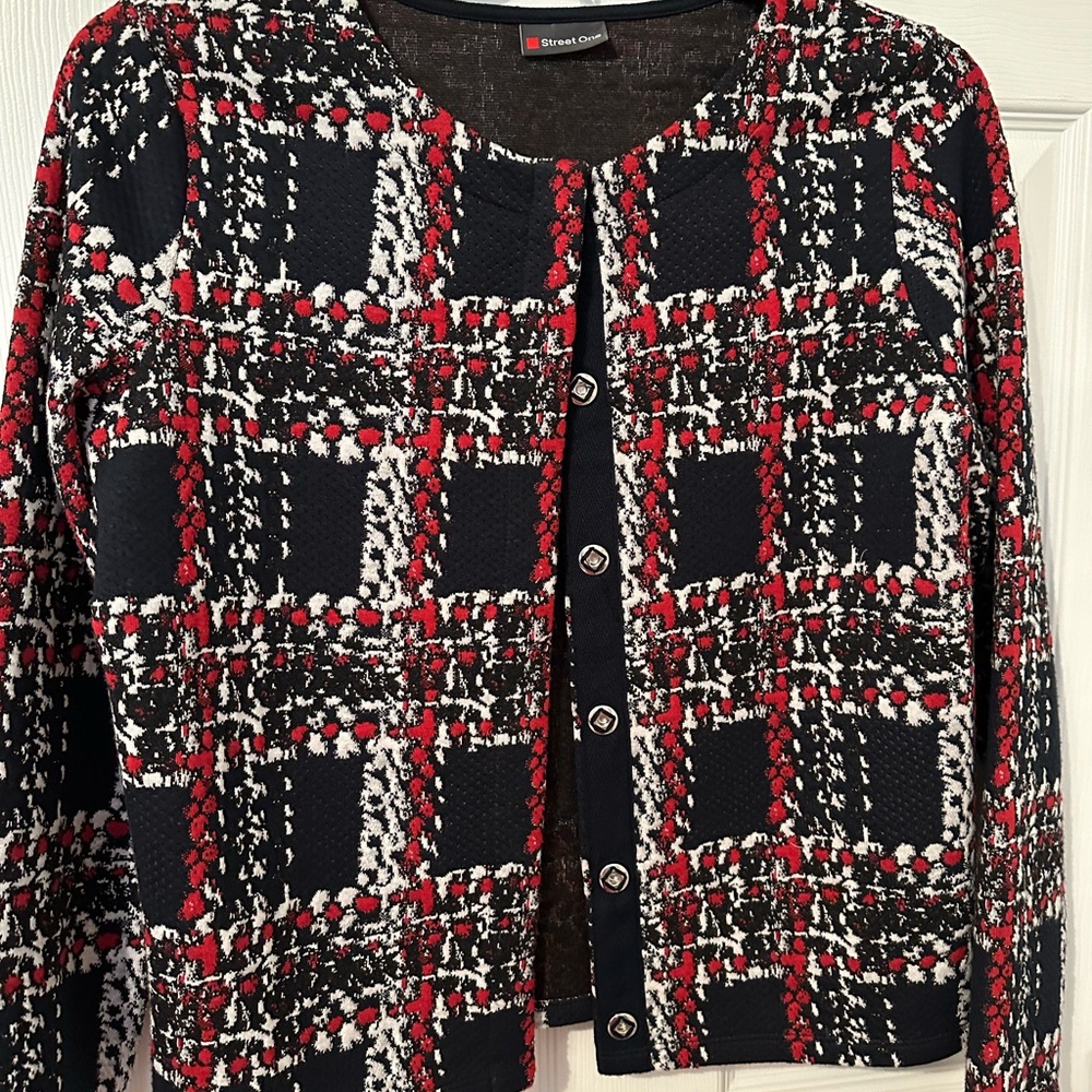 Short jacket from Germany size m. Hidden snaps front.